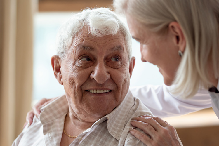 Sunny Vista Senior Living Community in Colorado Springs, CO - sunny vista senior man with female caregiver