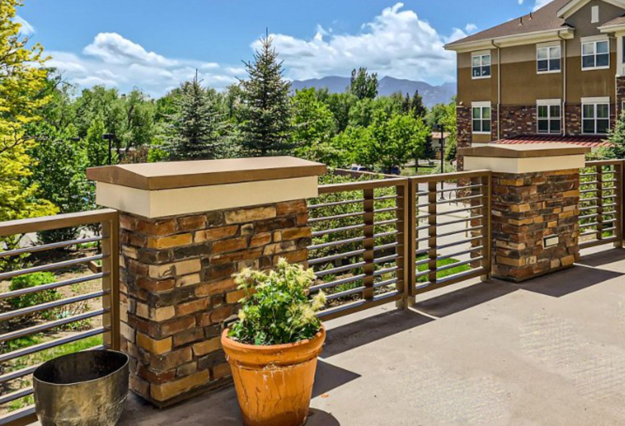 Sunny Vista Senior Living Community in Colorado Springs, CO - sunny vista living center exterior patio2 landscape