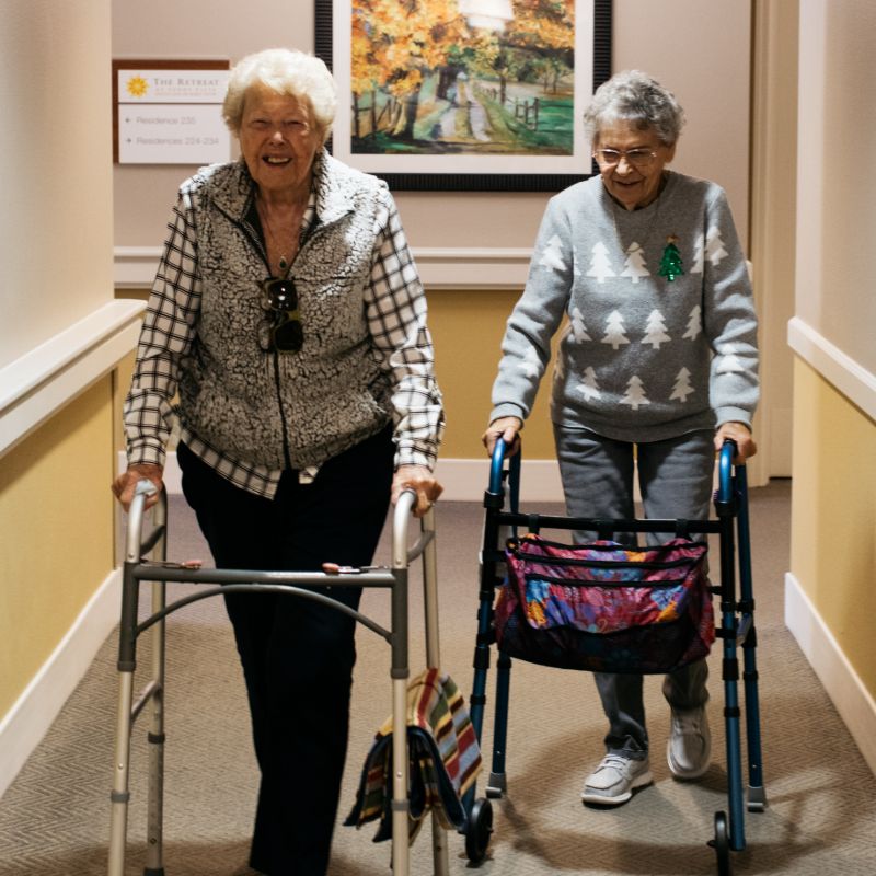 Sunny Vista Senior Living Community in Colorado Springs, CO - the retreat residents walking square