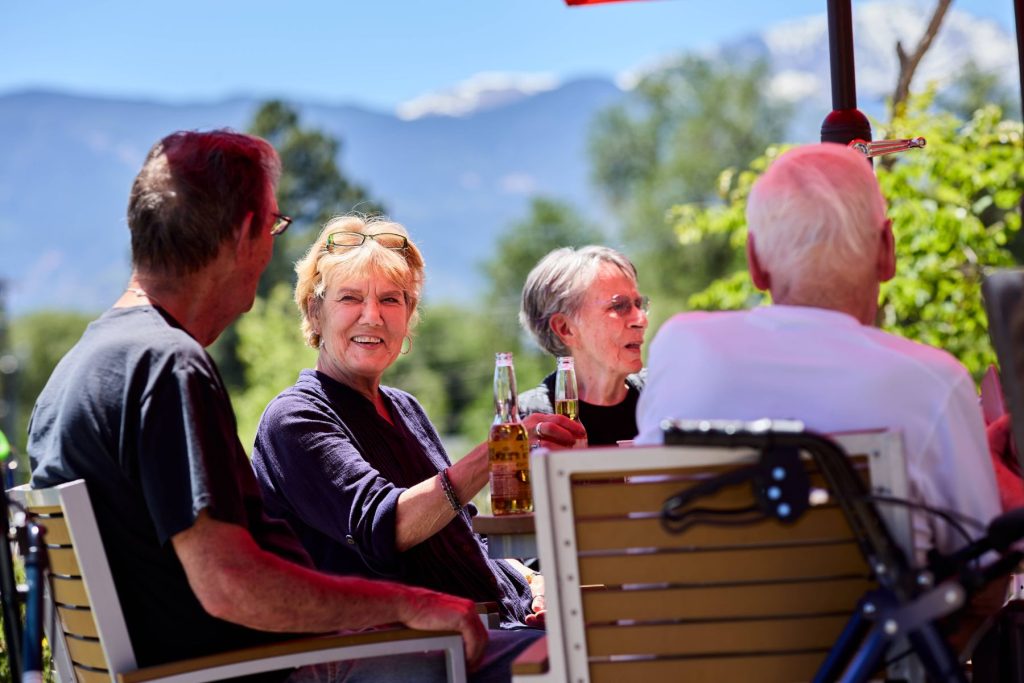 Sunny Vista Senior Living Community in Colorado Springs, CO - sunny vista residents at happy hour landscape